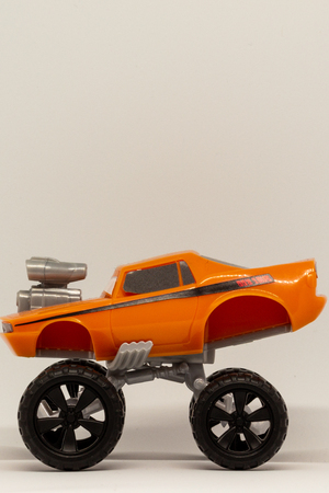 Gifts that can be found in an Easter egg. A four-wheel-drive vehicle in a children's toy version.の写真素材