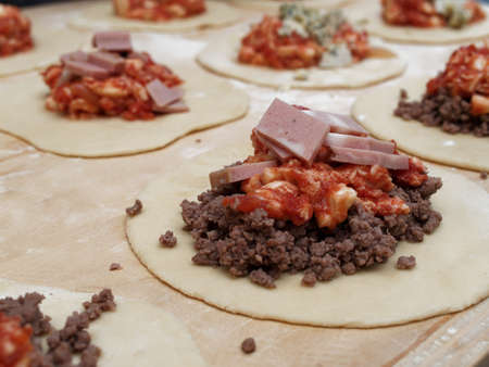 Preparations for a panzerotto, a specialty of southern Italian cuisine.の写真素材
