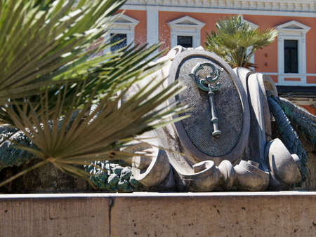 Bari, Italy - 08 02 2020: A walk on a hot August day through the streets of Bari, a city in southern Italy. Details of the station fountain, a reference point for tourists and inhabitants.のeditorial素材
