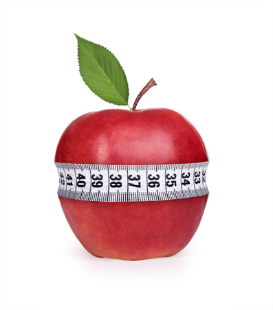 Red apple with measurement isolated on whiteの写真素材