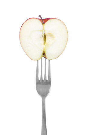 fork with appleの写真素材
