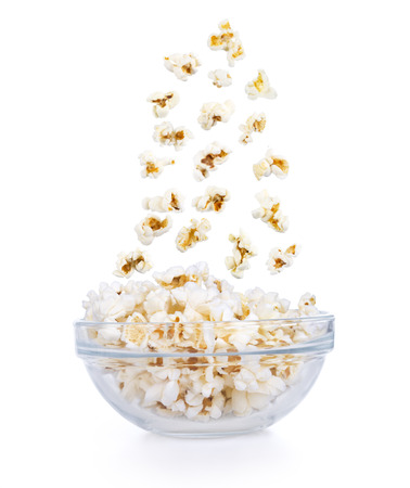 Popcorn falling in a bowlの写真素材