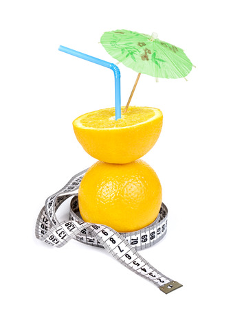 Picture of healthy cocktail and tape measure isolated on whiteの写真素材