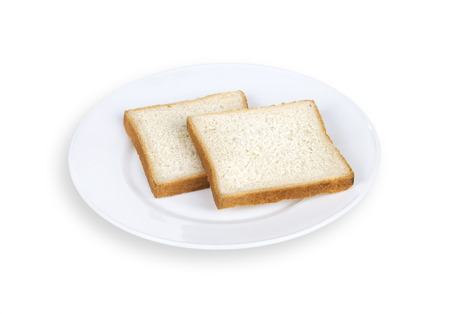 Sliced Bread on Plate on White Backgroundの写真素材