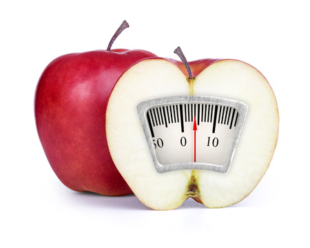 Red apple with slice isolated on whiteの写真素材