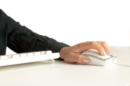 computer mouse in hand isolated on white