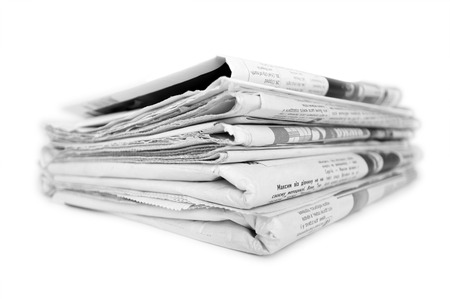 newspapers isolated in whiteの写真素材