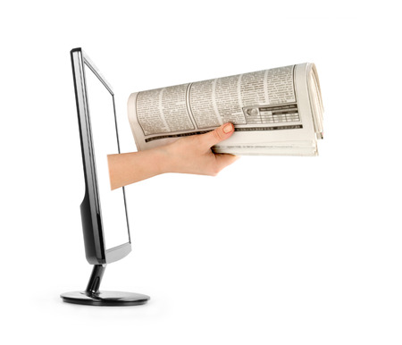 newspapers on white backgroundの写真素材