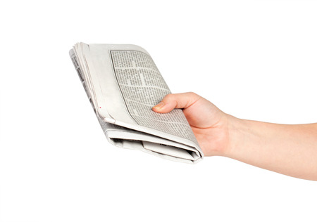 newspapers on white backgroundの写真素材