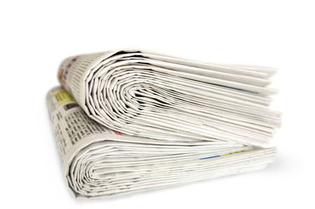 newspapers isolated in whiteの写真素材