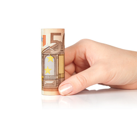 euro money roll in handの写真素材