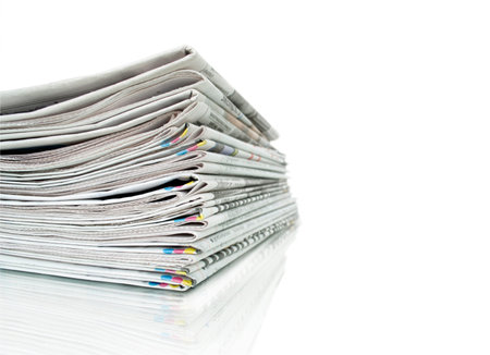 newspapers on white background
