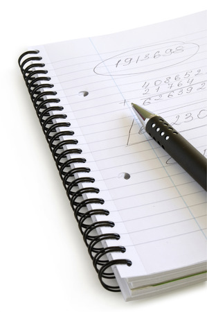 work notebook and pen isolated on whiteの写真素材