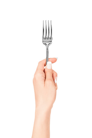 hand holding fork isolated on white backgroundの写真素材