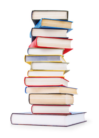 stack of old books on an isolated white backgroundの写真素材