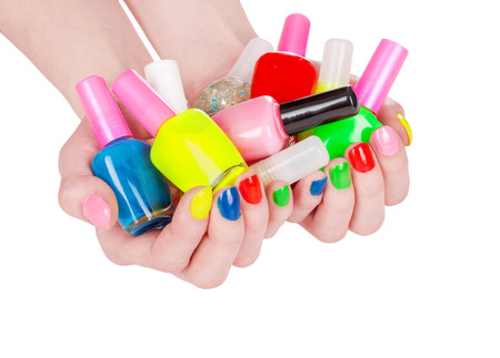 Multi-colored jelly sweets in the hands with a bright nail polishの写真素材
