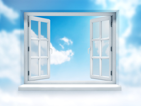 Open window against a white wall and the cloudy sky and sunの写真素材