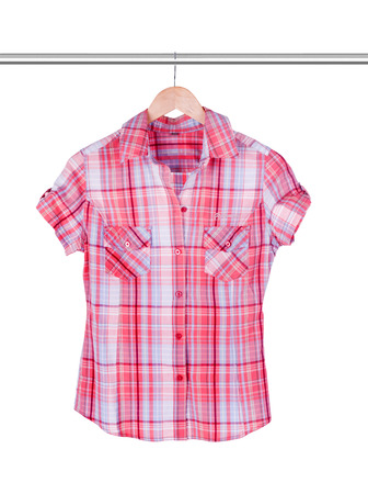 shirt on hanger isolated on whiteの写真素材