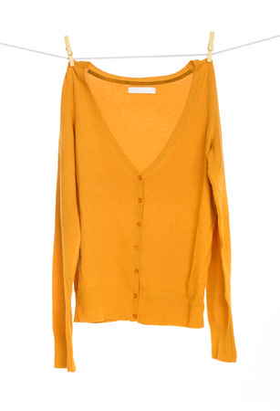jacket on clothespinsの写真素材
