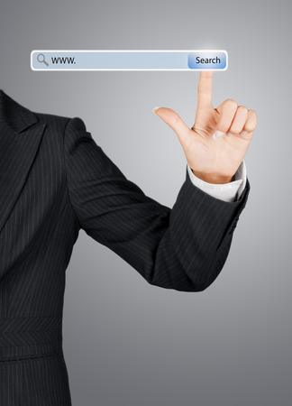 technology, searching system and internet concept - woman hand pressing Search buttonの写真素材
