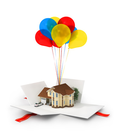 Opened gift with house on the white background.の写真素材