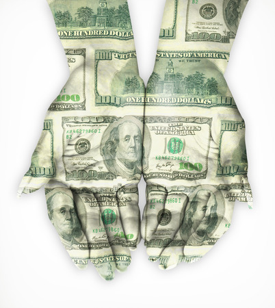 Hand coated in dollar banknotes. Isolated on whiteの写真素材
