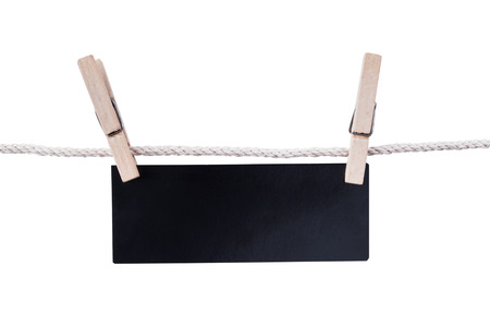 close up of a note and a clothes peg on white background with clipping pathの写真素材