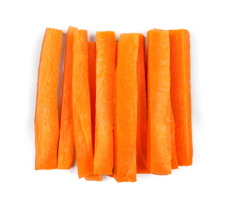 slices of fresh carrots on a white backgroundの写真素材