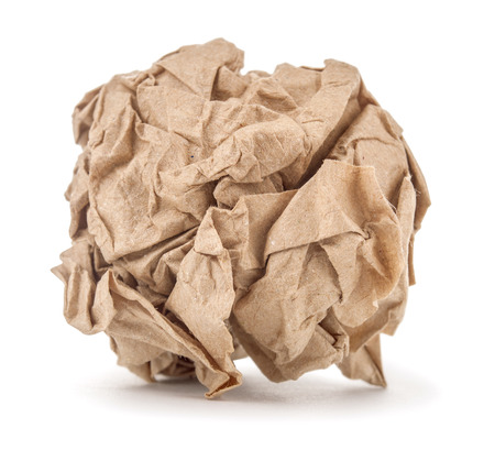 kraft paper crumpled into a ball on a white backgroundの写真素材