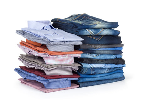 stack Jeans and dress shirts on white background