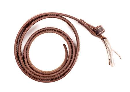 leather belt on a white backgroundの写真素材