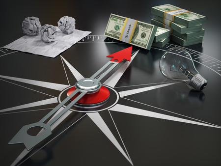 Conceptual image of compass directing at money. Course concept.の写真素材