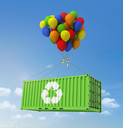 The concept of ecological transportation. Balloons are a freight container on a background of blue sky.の写真素材