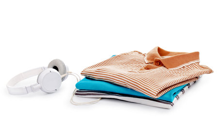 T-shirts in shopping bags on a white