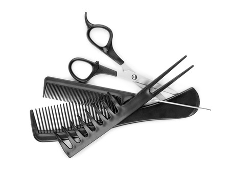 combs and scissor on a whiteの写真素材