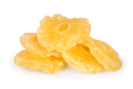 dry pineapple heap against white backgroundの写真素材