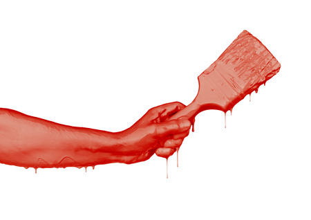 Hand in the paint isolated on whiteの写真素材