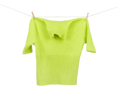 jacket on a clothesline isolated on whiteの写真素材