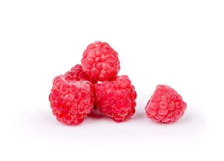 Ripe raspberries isolated on white background cutout