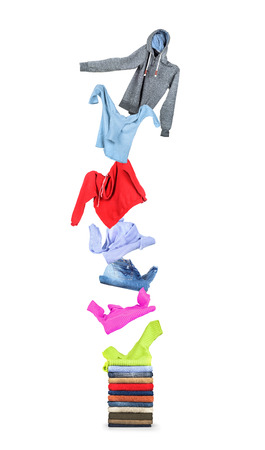 Clothing flies on a pile isolated on white backgroundの写真素材