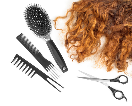 hair with scissors on close up isolated on white backgroundの写真素材