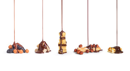 cookies, chocolate,nuts pouring stream of chocolate collection on a white background