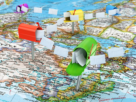 Concept of mailing on the world map mailboxes with lettersの写真素材