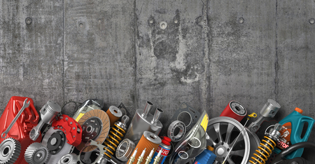 Border of auto parts on concrete wall.の写真素材