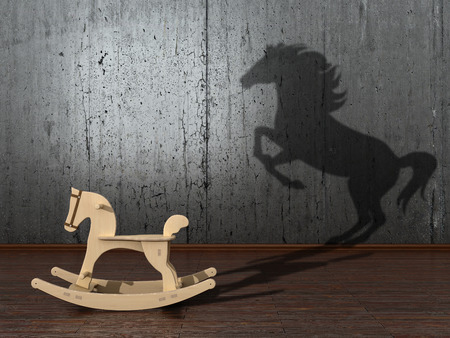 The concept of the hidden potencial.Toy horse in the room which casts a shadow on the wall. 3D illustrationの写真素材