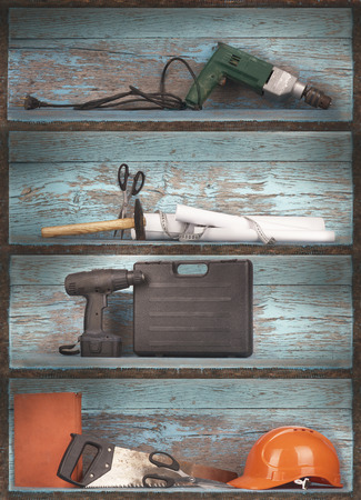 construction tools on wooden shelvesの写真素材
