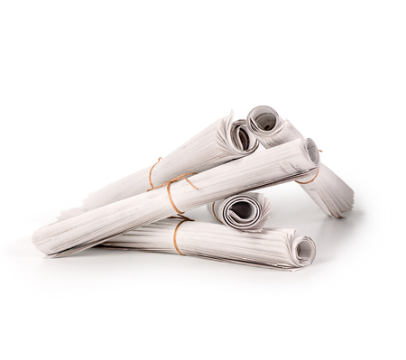 A pile of folded newspapersの写真素材
