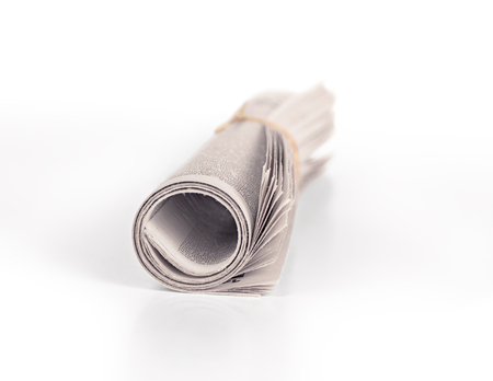 rolled-up nnewspaperの写真素材