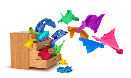 Things flying out of a dresser on a white background2.の写真素材