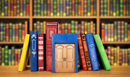 Concept of education. Stack of books with door on a library background. Concept of knowledge.の写真素材